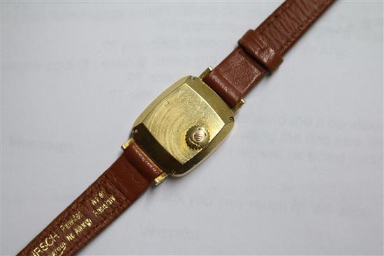 A ladys 18ct gold Baume & Mercier manual back wind wrist watch.